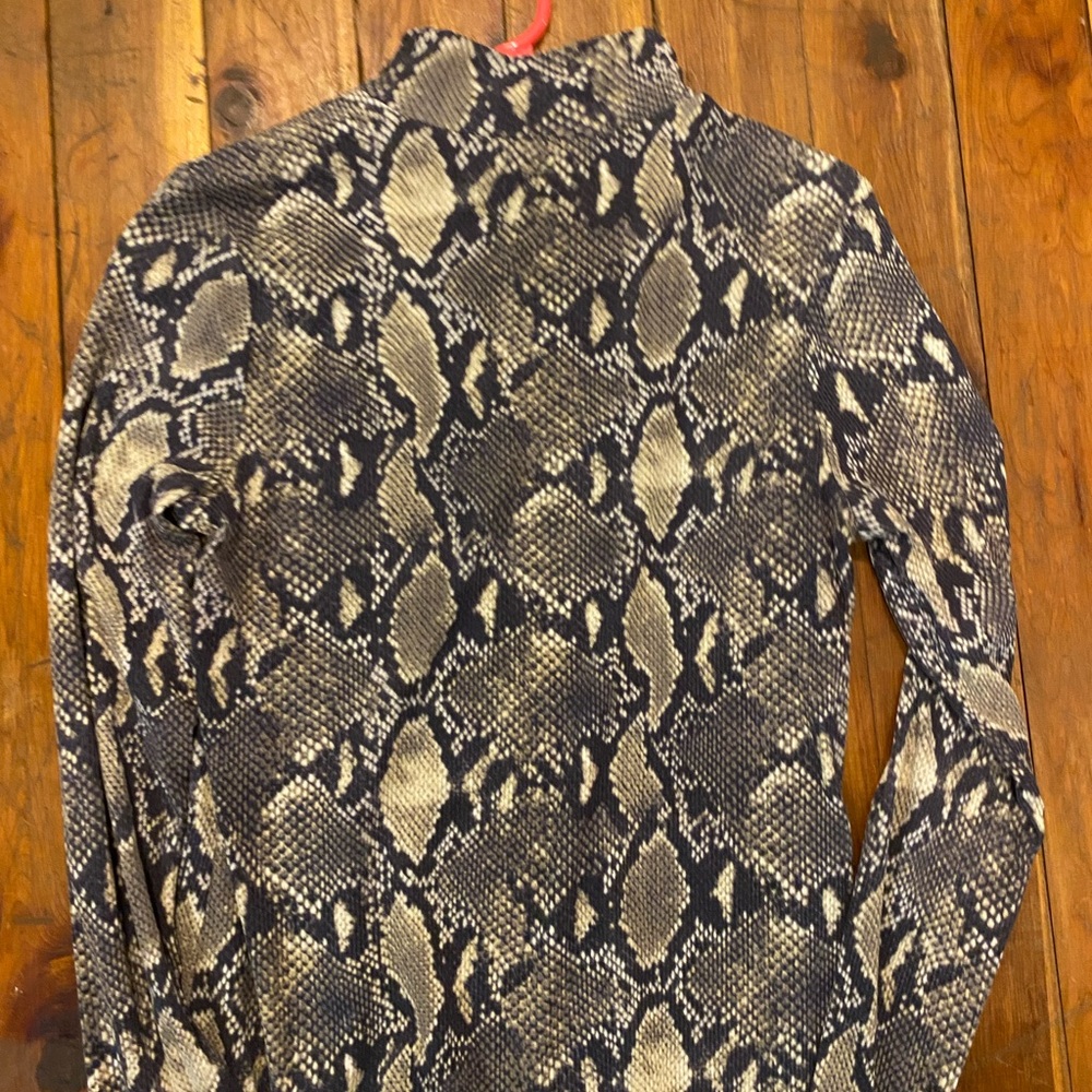 snake skin turtle neck